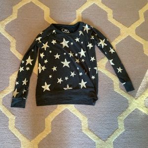navy blue sweater with large stars